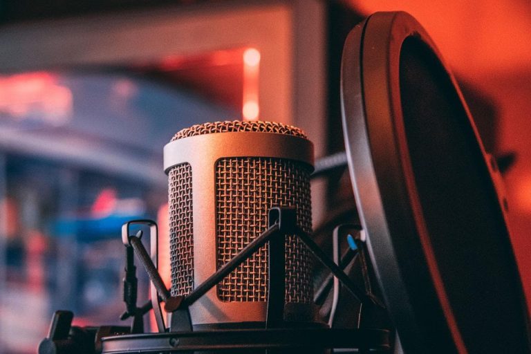 Behind the Scenes: The Role of Music Producers in Shaping a Hit